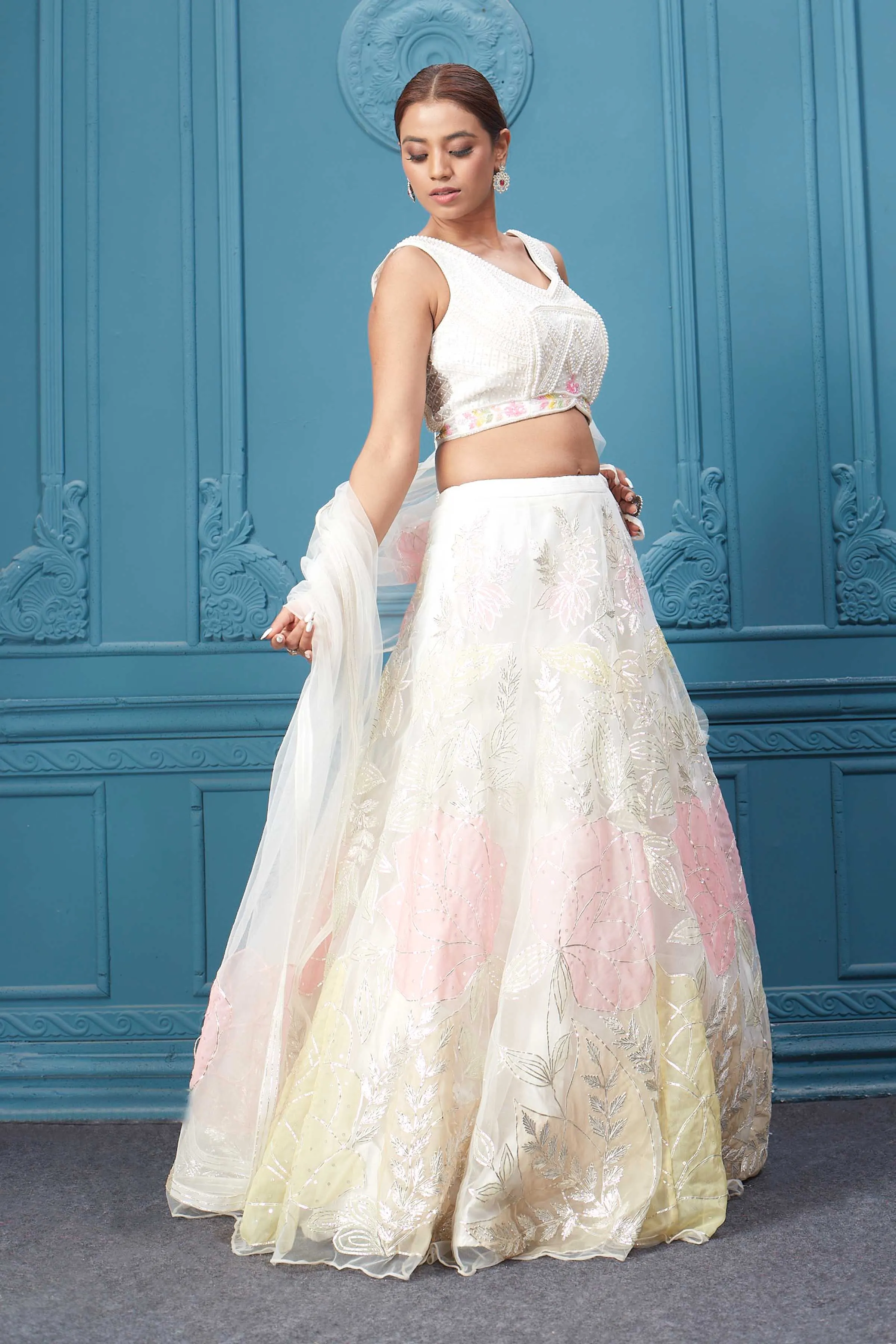 310045 Off White Floral Printed Lehenga With Sleeveless Blouse