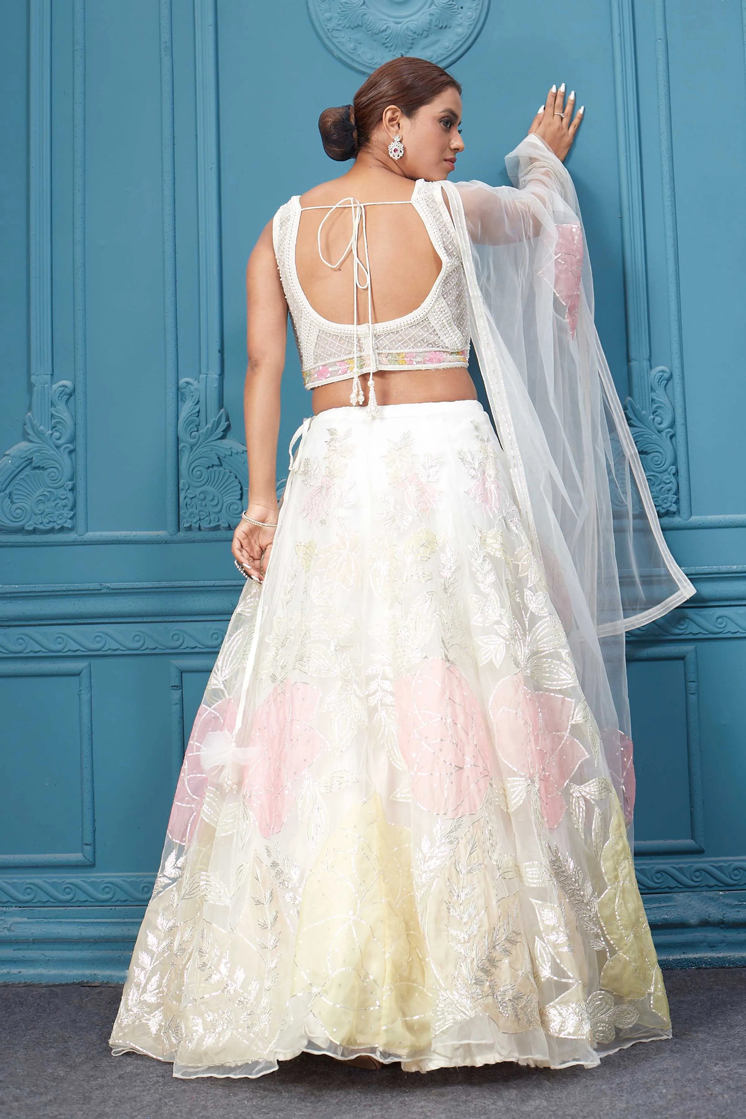 310045 Off White Floral Printed Lehenga With Sleeveless Blouse