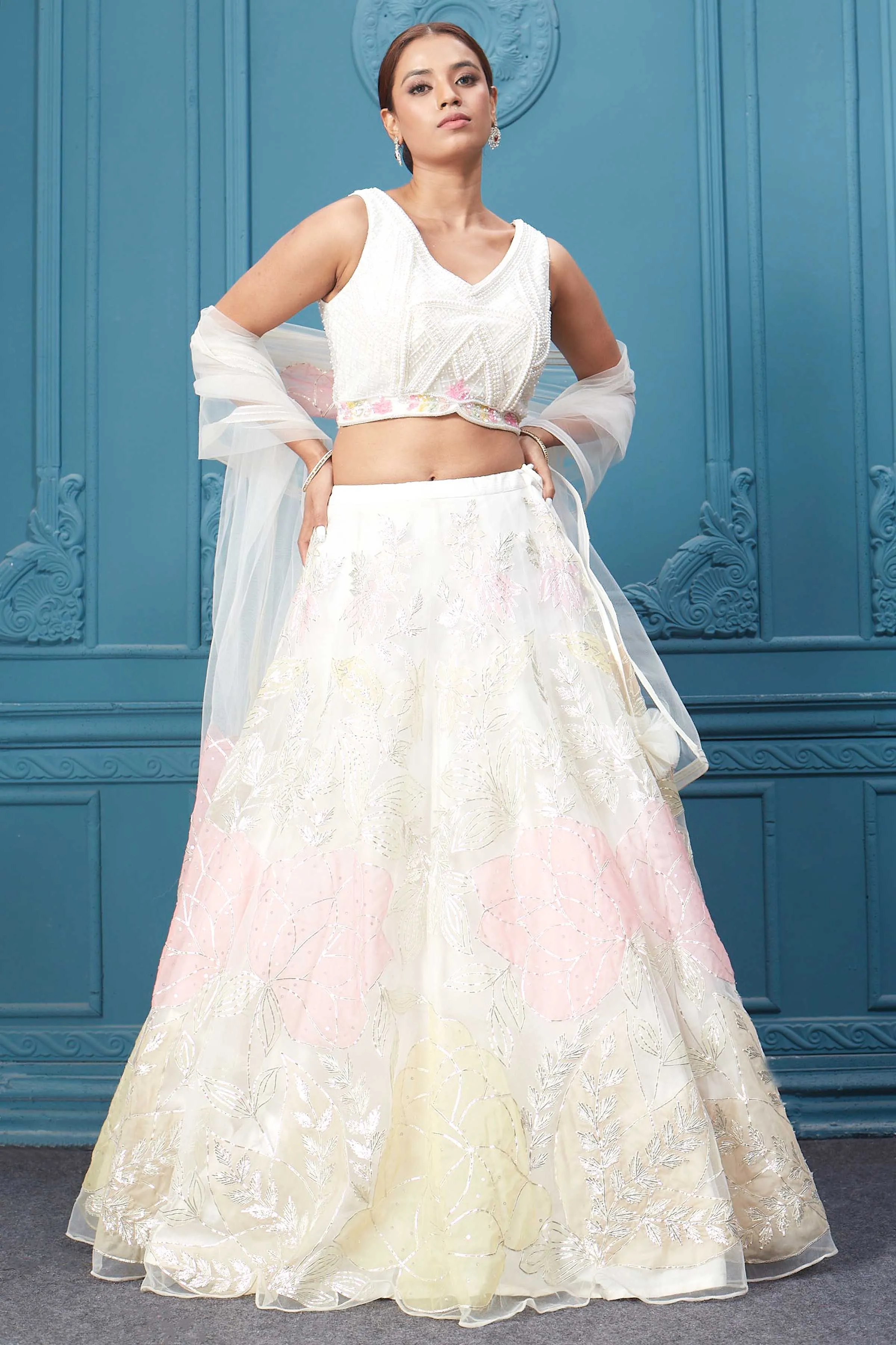 310045 Off White Floral Printed Lehenga With Sleeveless Blouse