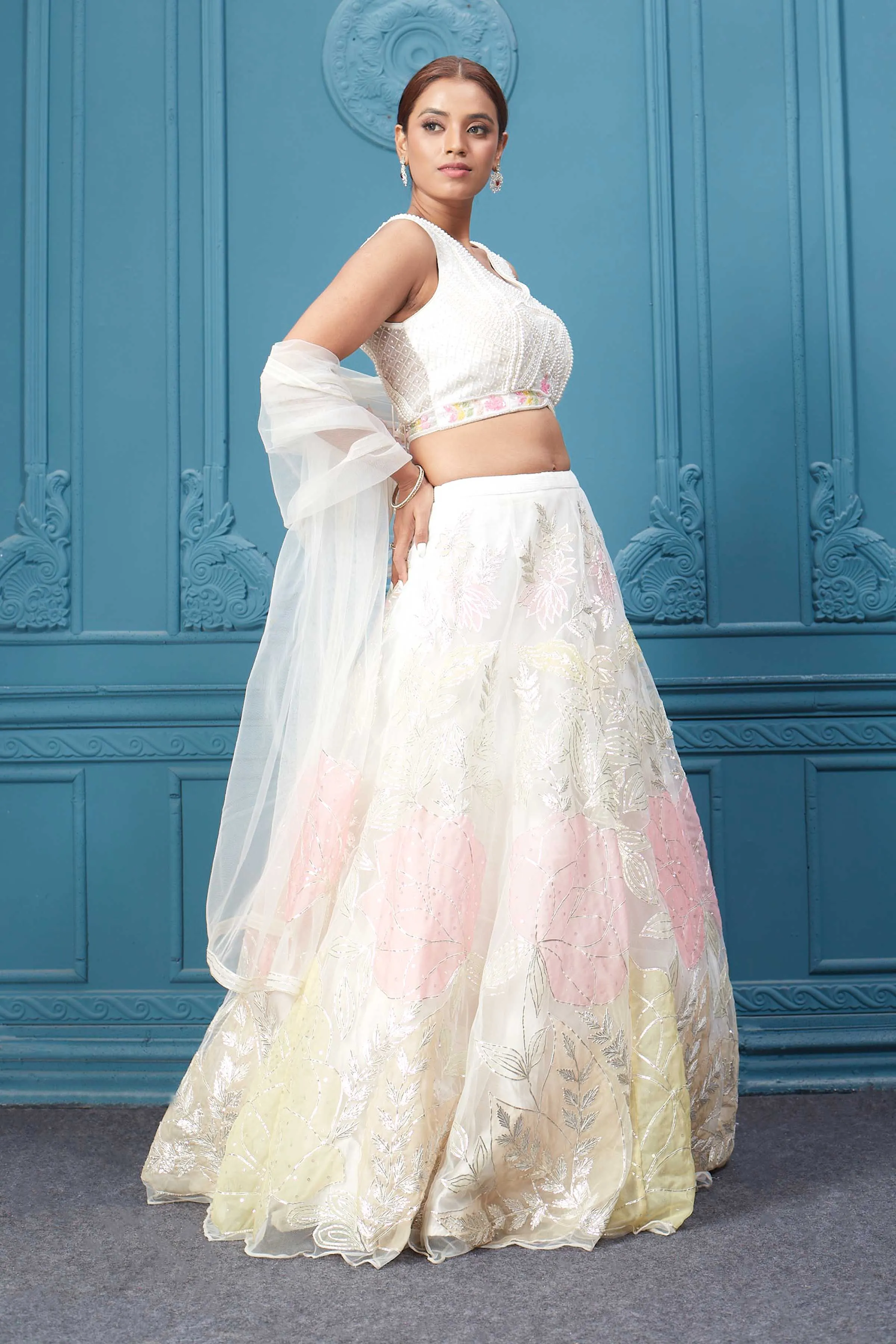 310045 Off White Floral Printed Lehenga With Sleeveless Blouse