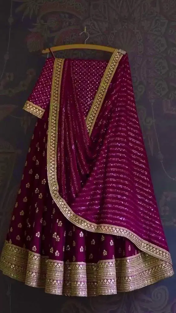 Attractive Wine Colored Faux Georgette Sequins And Embroidery With Multi Needle Work Lehenga Choli For Women