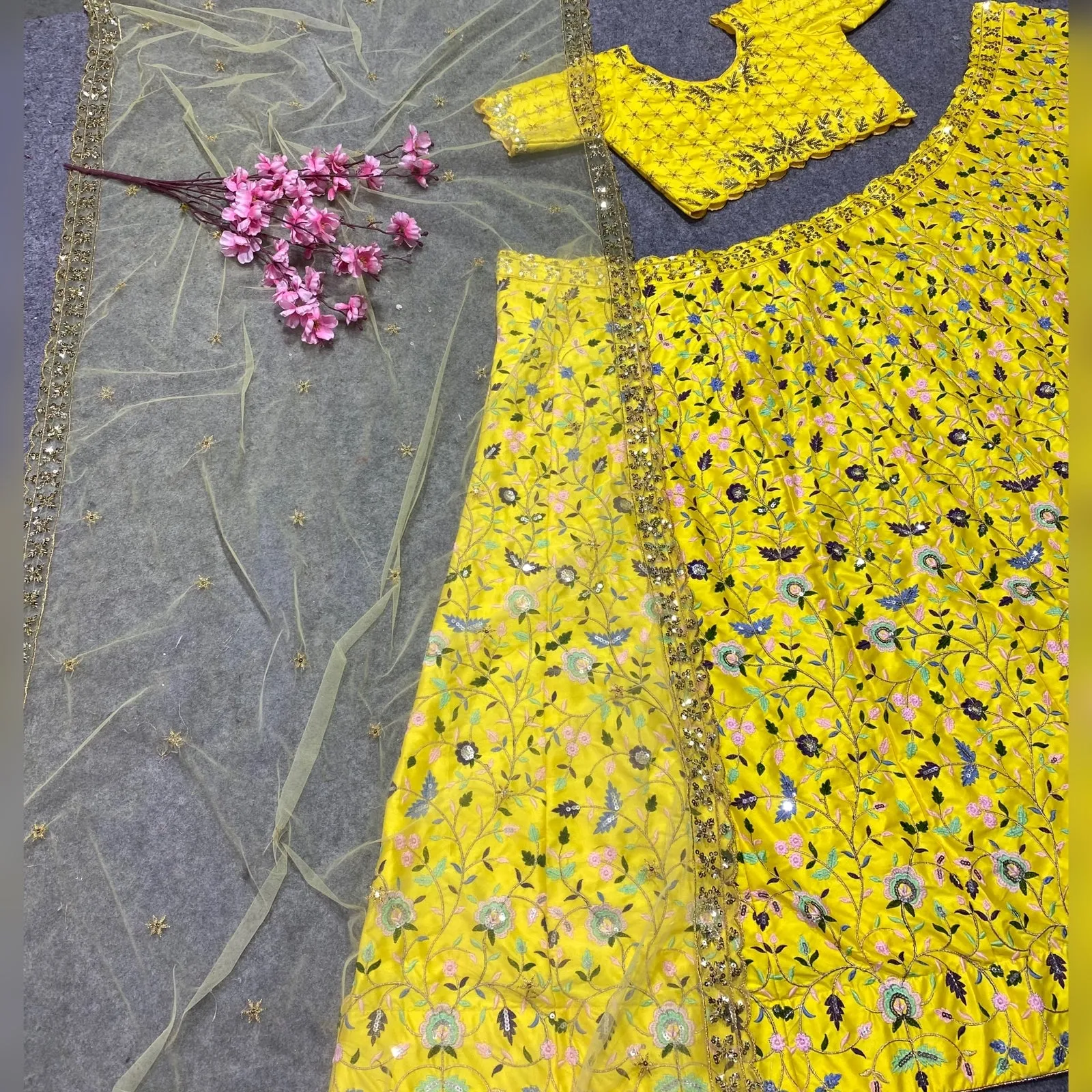 Attractive Yellow Color Malay Satin Silk Flower Embroidered Lehenga Choli