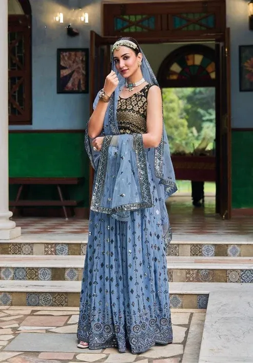 Beautiful Blue Colored Party Wear Lehenga Choli With Heavy Net Dupatta For Women