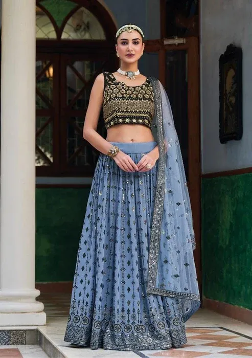 Beautiful Blue Colored Party Wear Lehenga Choli With Heavy Net Dupatta For Women