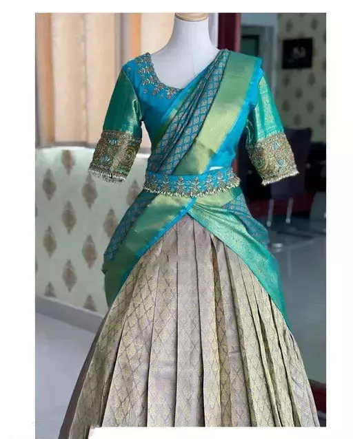 Classy Rama Green Color Banarasi Silk Half Saree Lehenga Choli With Flower Butti And Zari Work